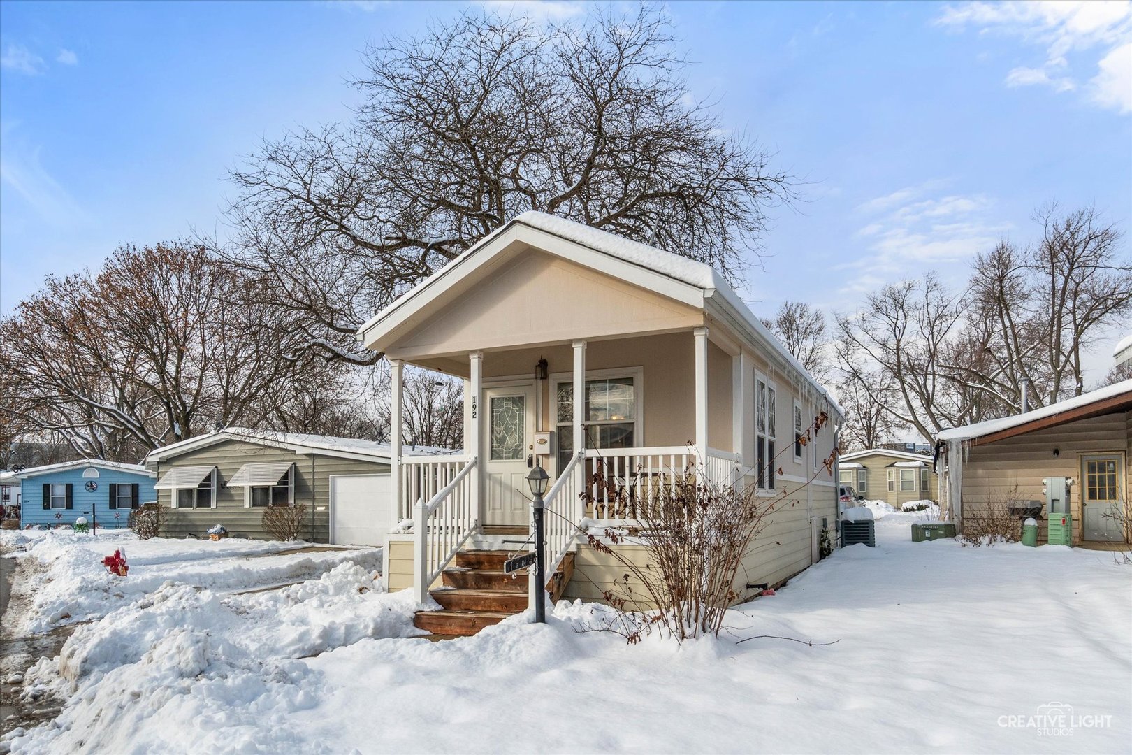 192 Parkwood Road Elgin, IL 60123 - Photo 1 of 14 a view of a house with a yard and wooden fence