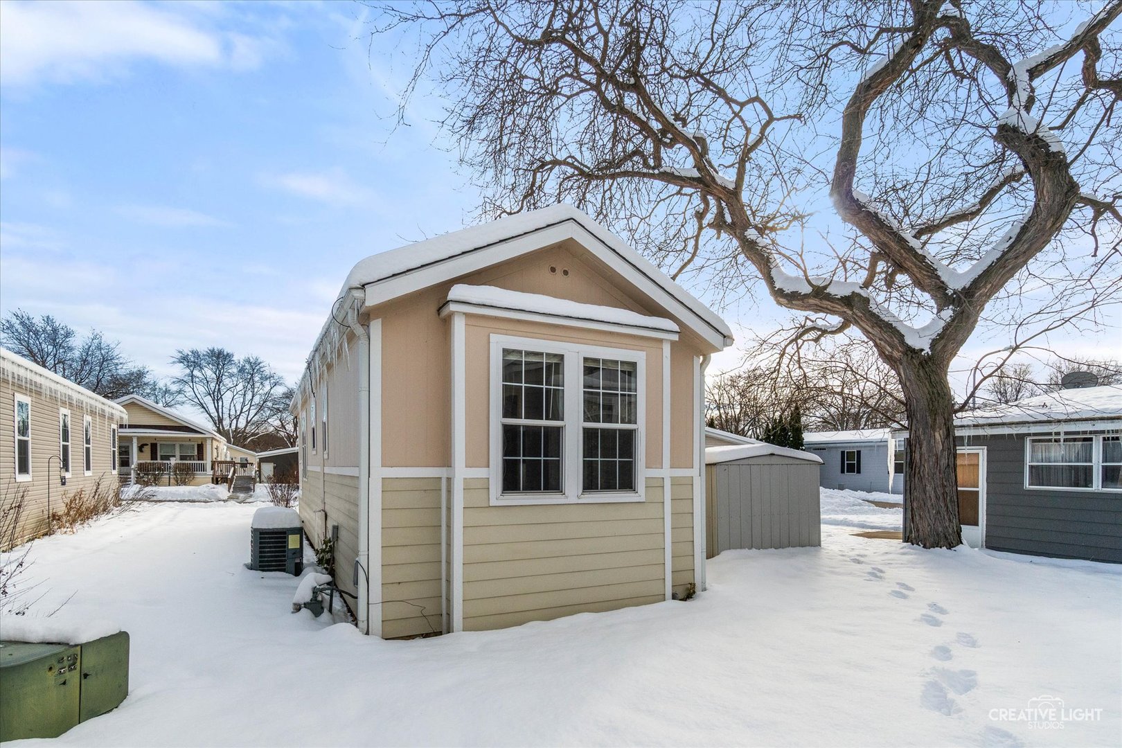 192 Parkwood Road Elgin, IL 60123 - Photo 11 of 14 a front view of a house with a yard