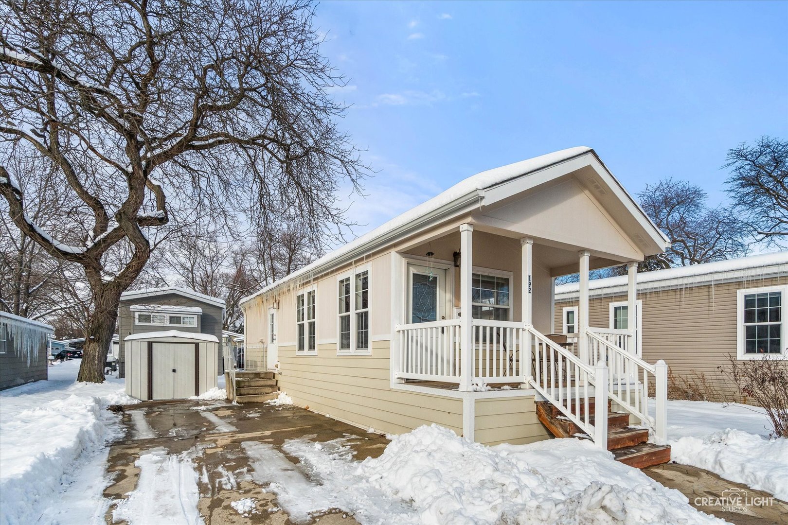 192 Parkwood Road Elgin, IL 60123 - Photo 14 of 14 a front view of a house with a yard