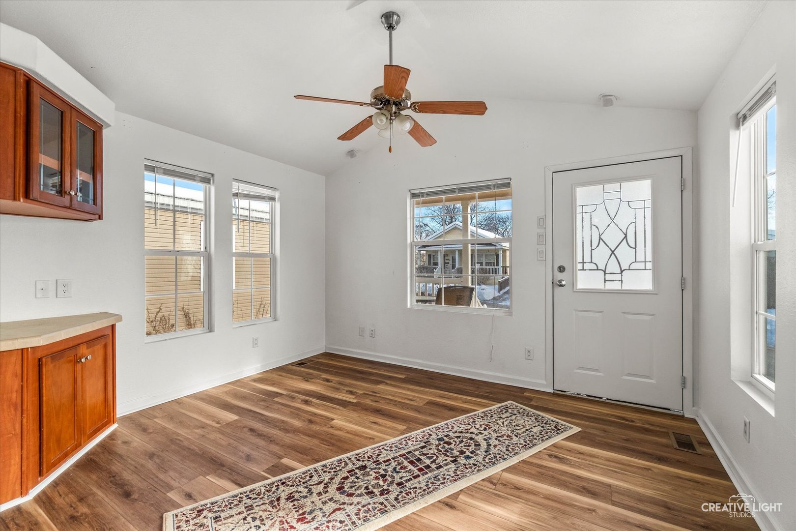192 Parkwood Road Elgin, IL 60123 - Photo 3 of 14 a view of an empty room with a window