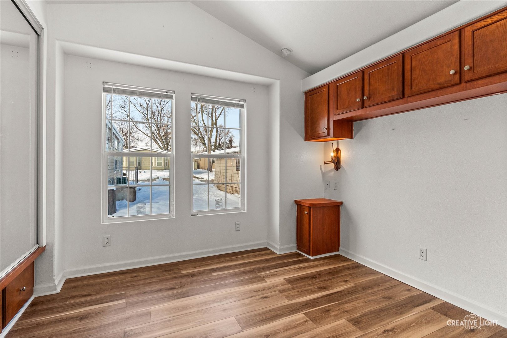 192 Parkwood Road Elgin, IL 60123 - Photo 8 of 14 a view of an empty room with a window