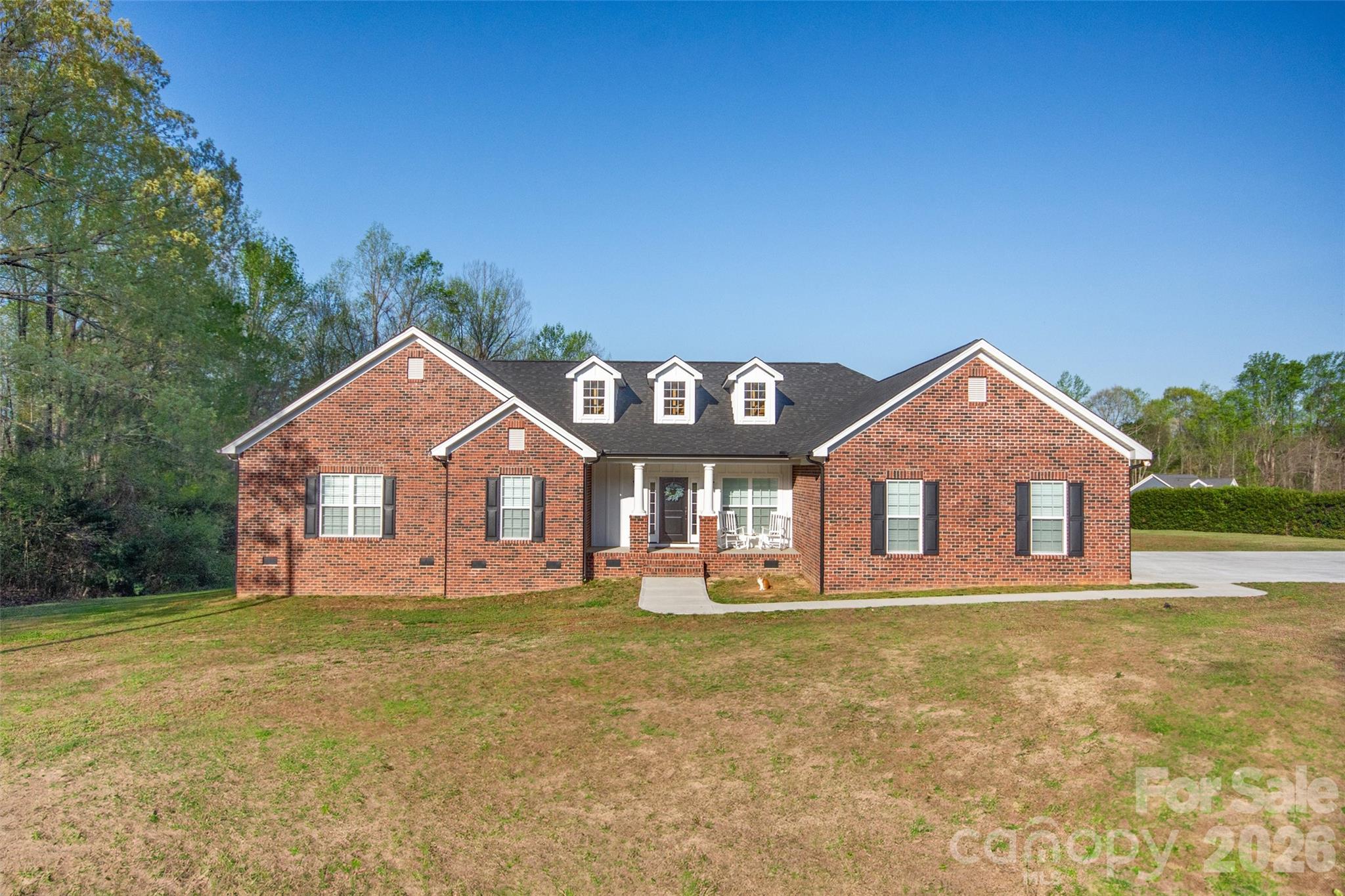540 New Salem Road, Unit 1011 Statesville, NC 28625 - Photo 1 of 36 front view of a house with a yard