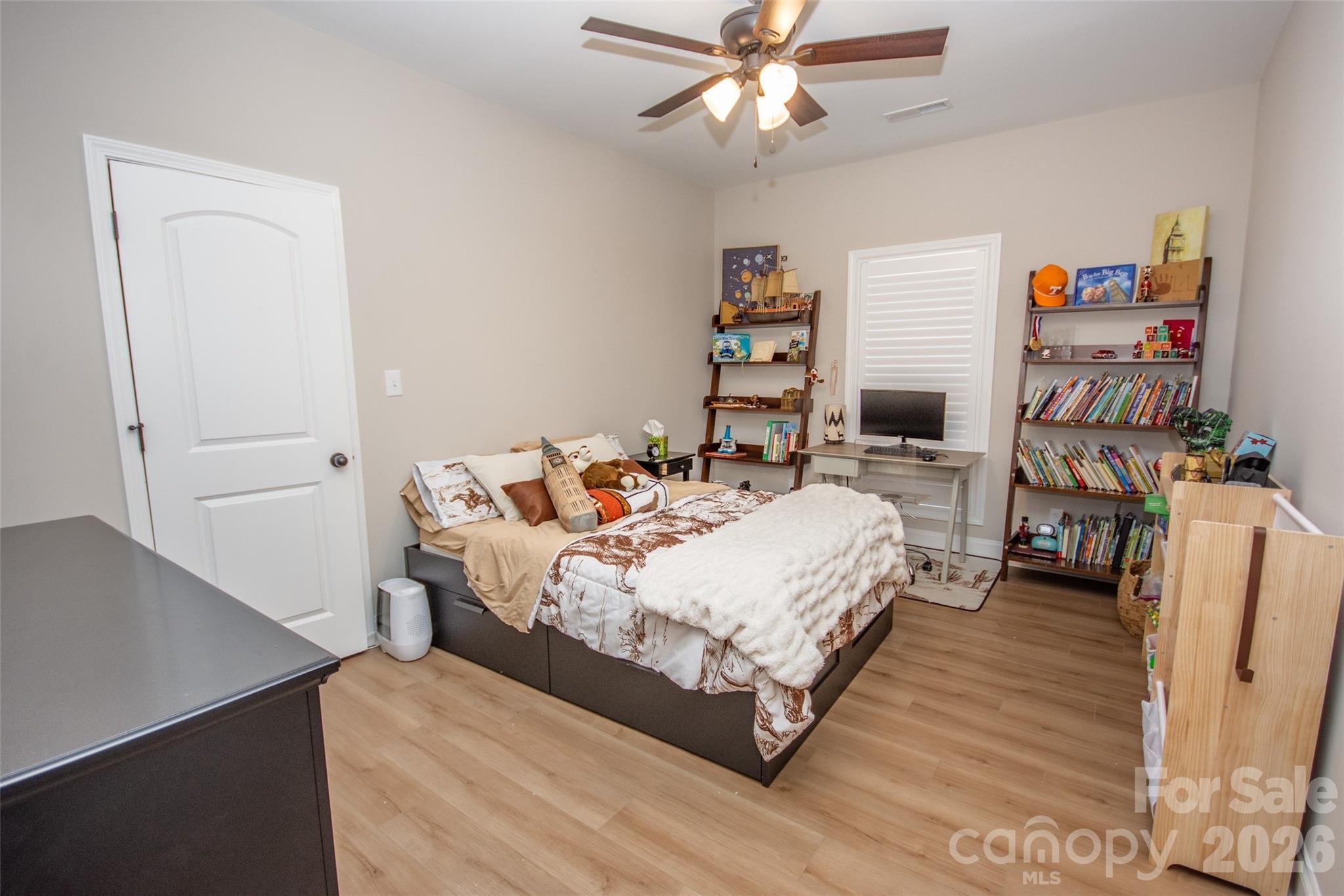 540 New Salem Road, Unit 1011 Statesville, NC 28625 - Photo 13 of 36 a living room with furniture and a chandelier