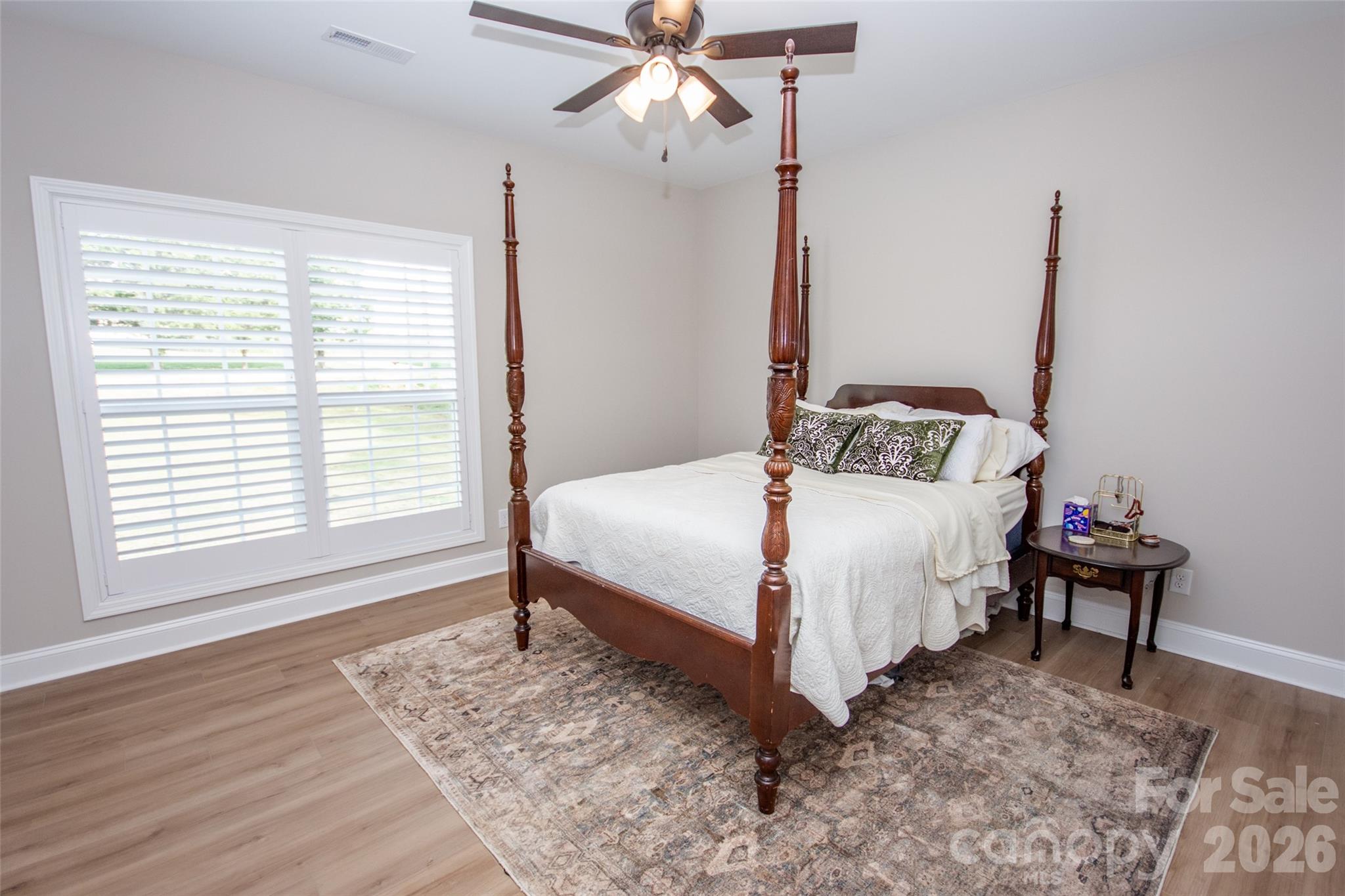 540 New Salem Road, Unit 1011 Statesville, NC 28625 - Photo 17 of 36 a bedroom with a bed and a window