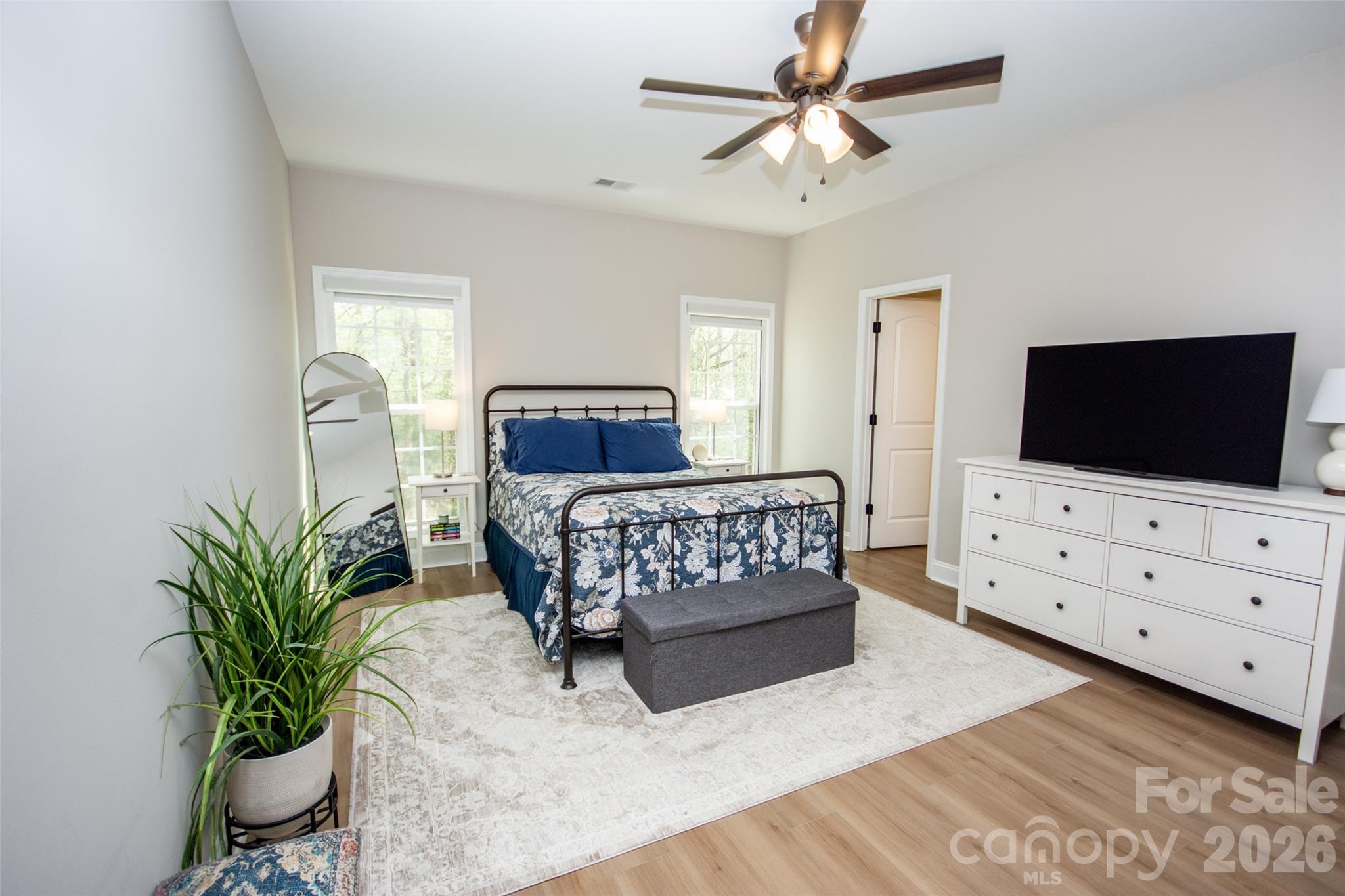 540 New Salem Road, Unit 1011 Statesville, NC 28625 - Photo 19 of 36 a living room with furniture and a flat screen tv