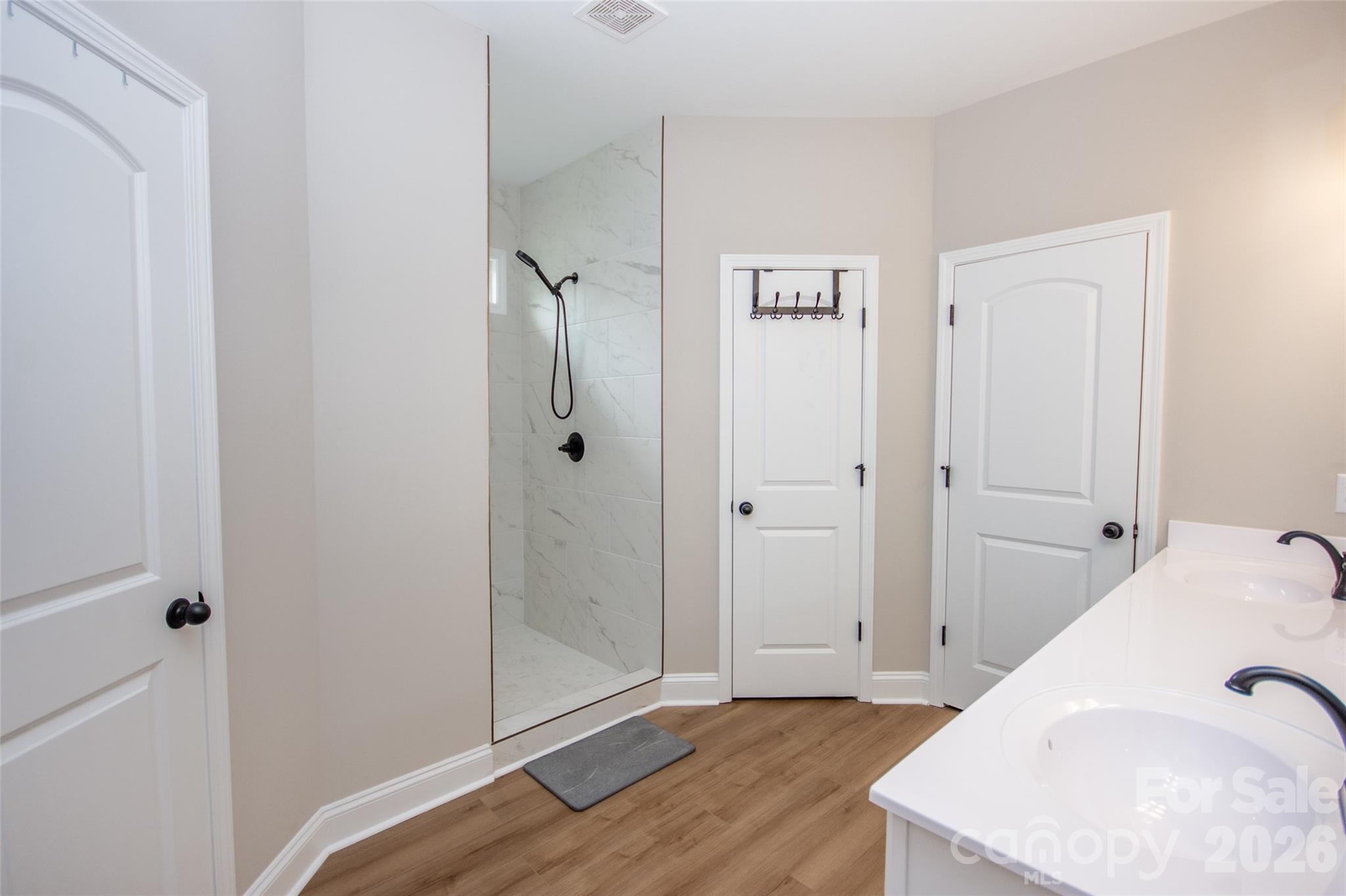 540 New Salem Road, Unit 1011 Statesville, NC 28625 - Photo 21 of 36 a view of a bathroom with sink