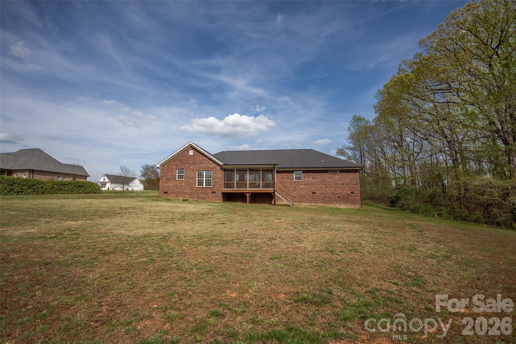 540 New Salem Road, Unit 1011 Statesville, NC 28625 - Photo 33 of 36 a house with huge green field in front of it