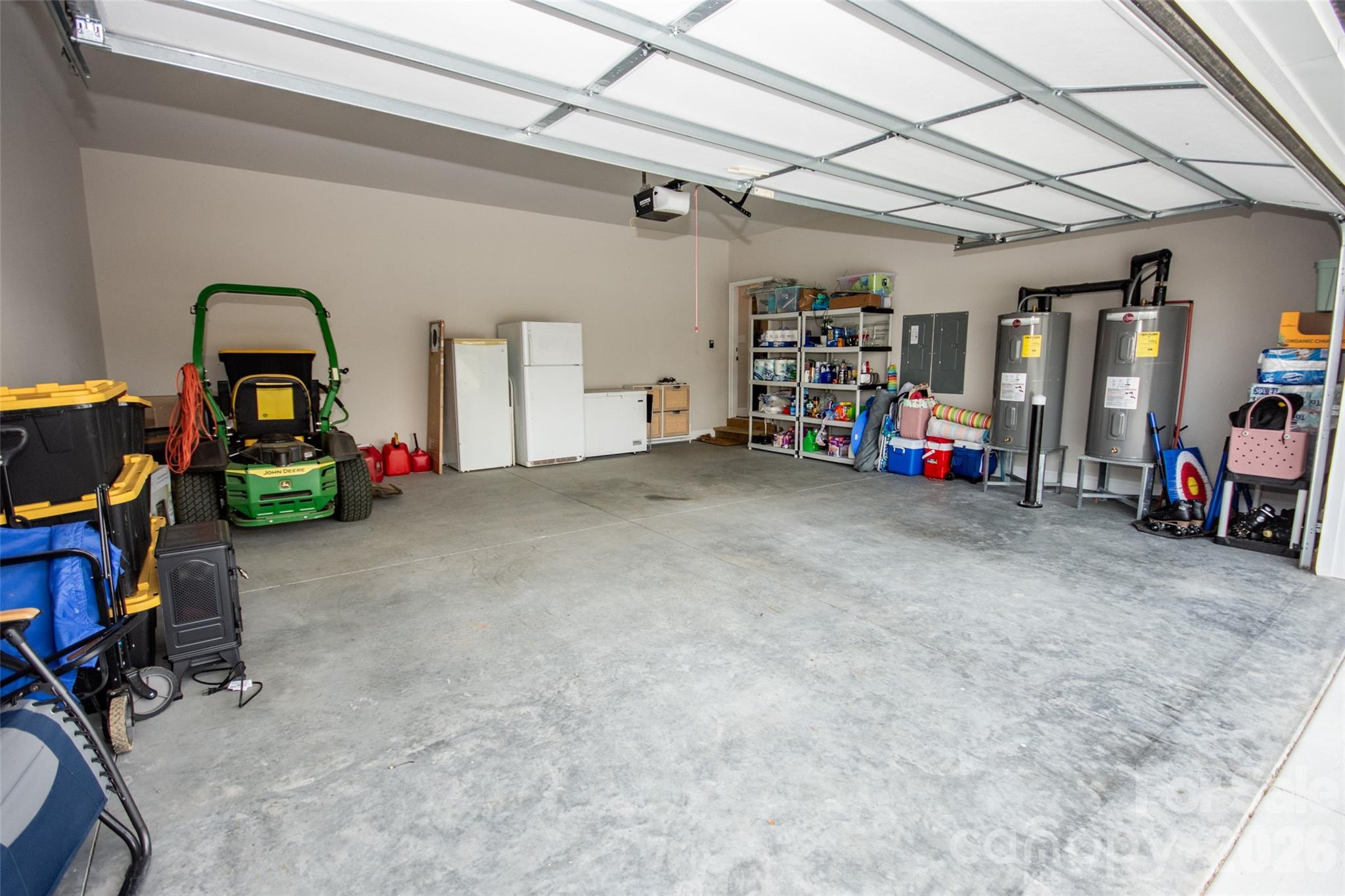 540 New Salem Road, Unit 1011 Statesville, NC 28625 - Photo 36 of 36 a view of a garage with cars