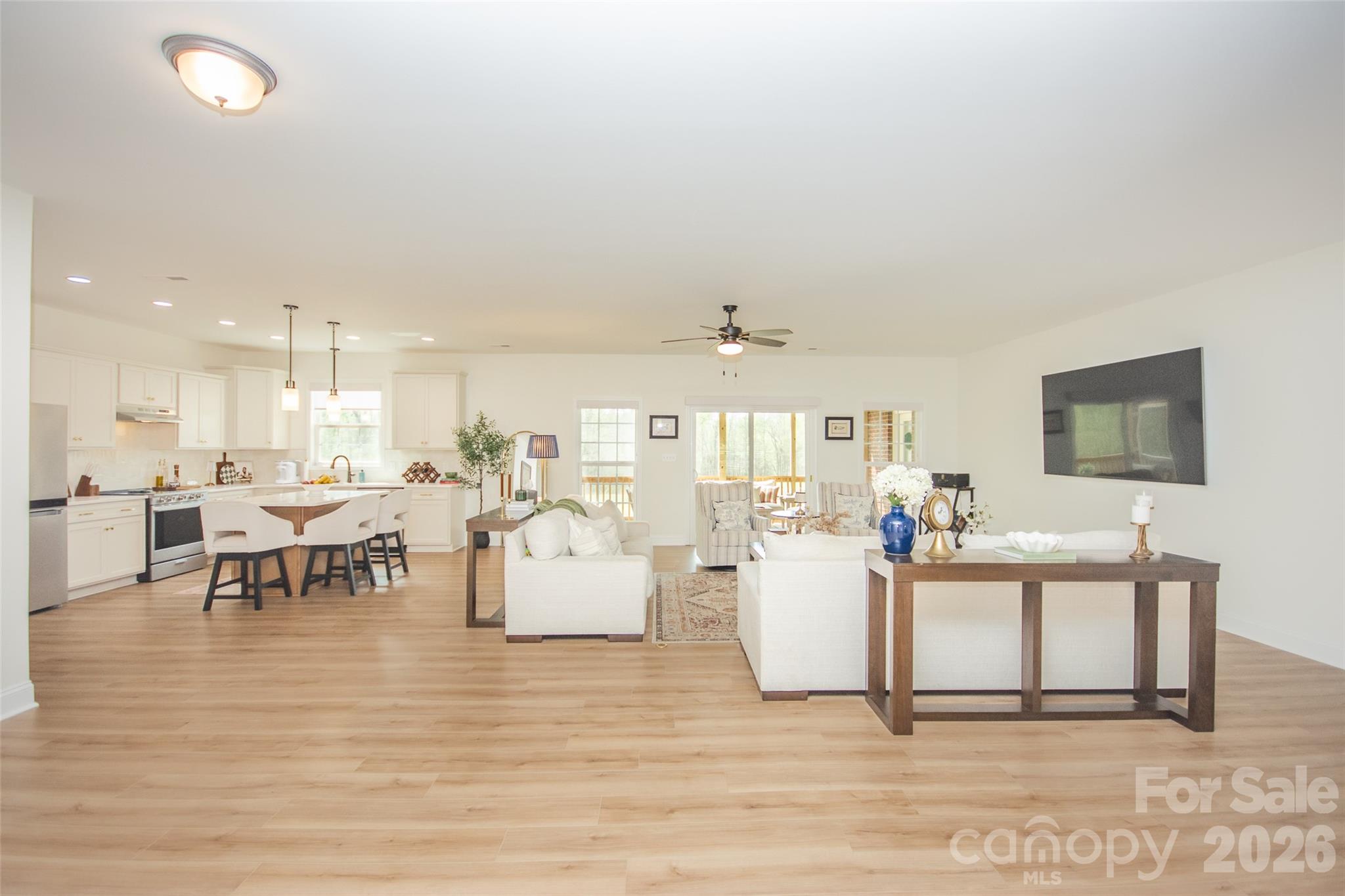 540 New Salem Road, Unit 1011 Statesville, NC 28625 - Photo 5 of 36 a living room with furniture and a table