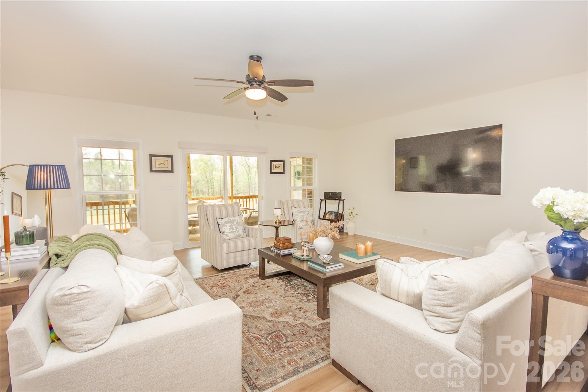 540 New Salem Road, Unit 1011 Statesville, NC 28625 - Photo 6 of 36 a living room with furniture and a large window