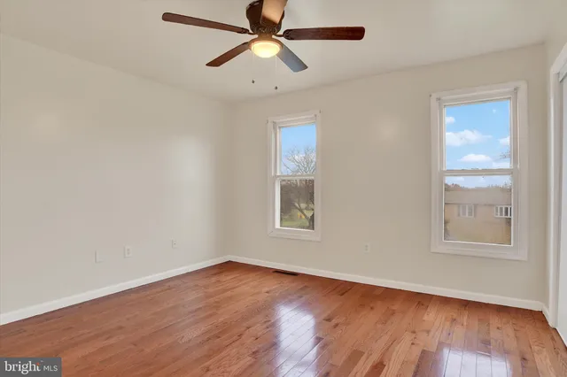 a view of a house with a yard and garage
