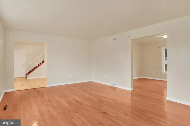 a kitchen with stainless steel appliances granite countertop a stove sink and cabinets