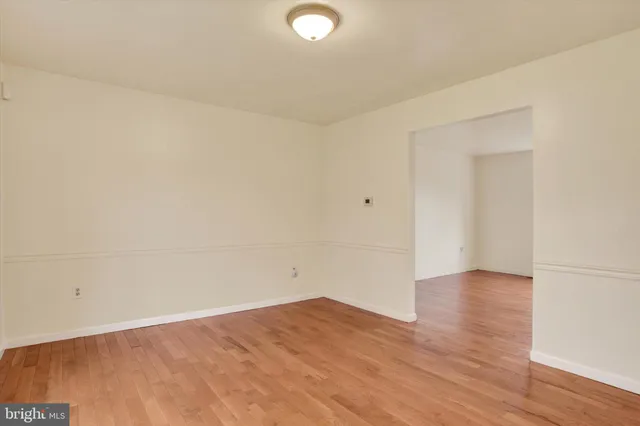a kitchen with stainless steel appliances a stove sink and cabinets