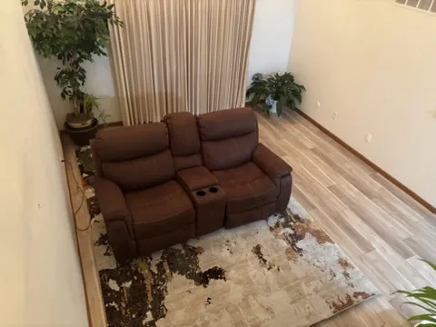 a view of a couches in a living room