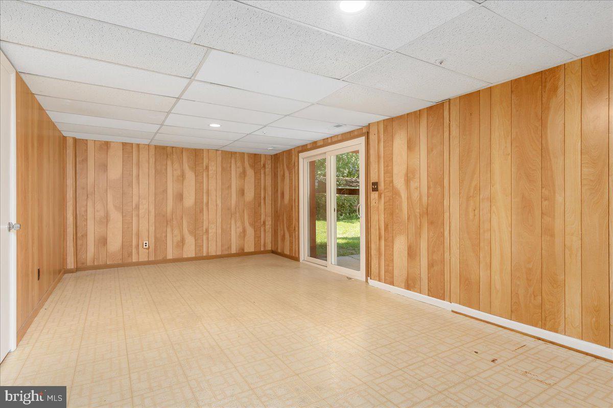 8004 Malcolm Road Clinton, MD 20735 - Photo 22 of 34 Lower level rec room with slider walkout