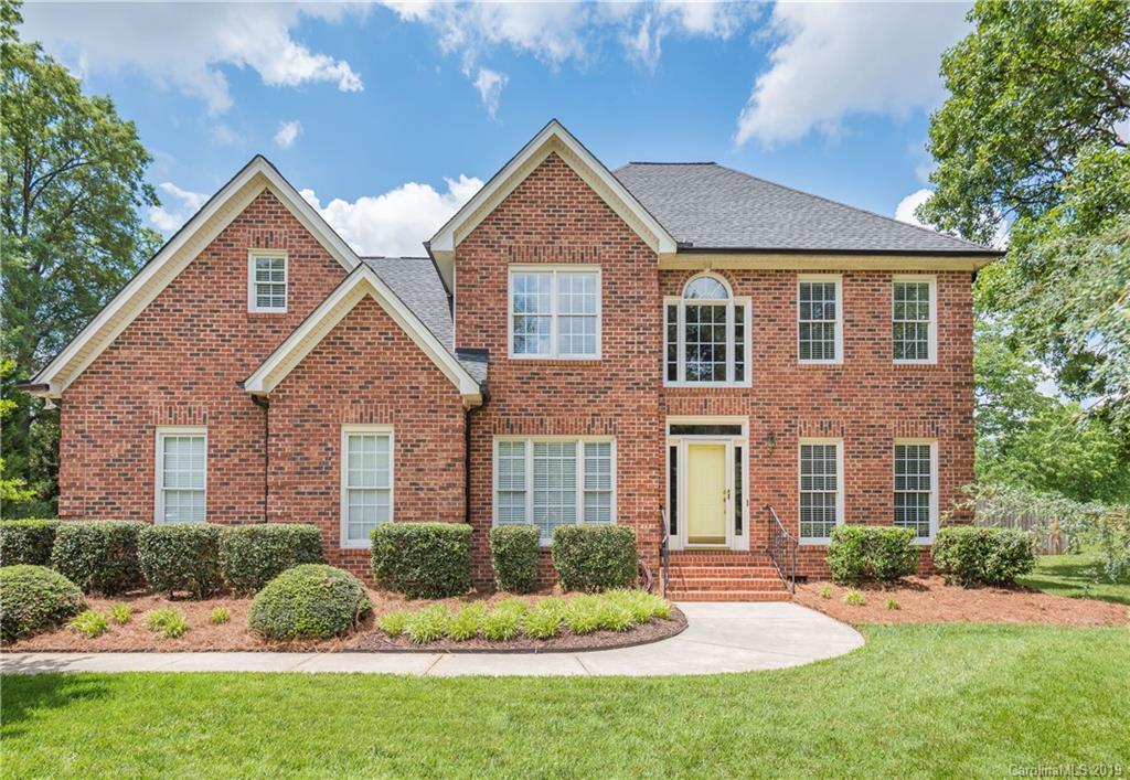 3310 Blue Jay Pass Fort Mill, SC 29708 - Photo 1 of 40 a front view of a house with a yard and garage