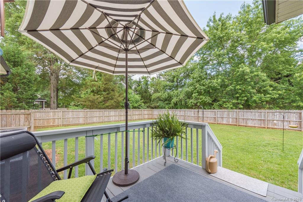 3310 Blue Jay Pass Fort Mill, SC 29708 - Photo 34 of 40 a view of a couches in the deck under a umbrella