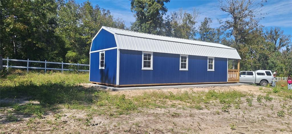 7285 Norman Street Webster, FL 33597 - Photo 6 of 11 a view of backyard with swimming pool