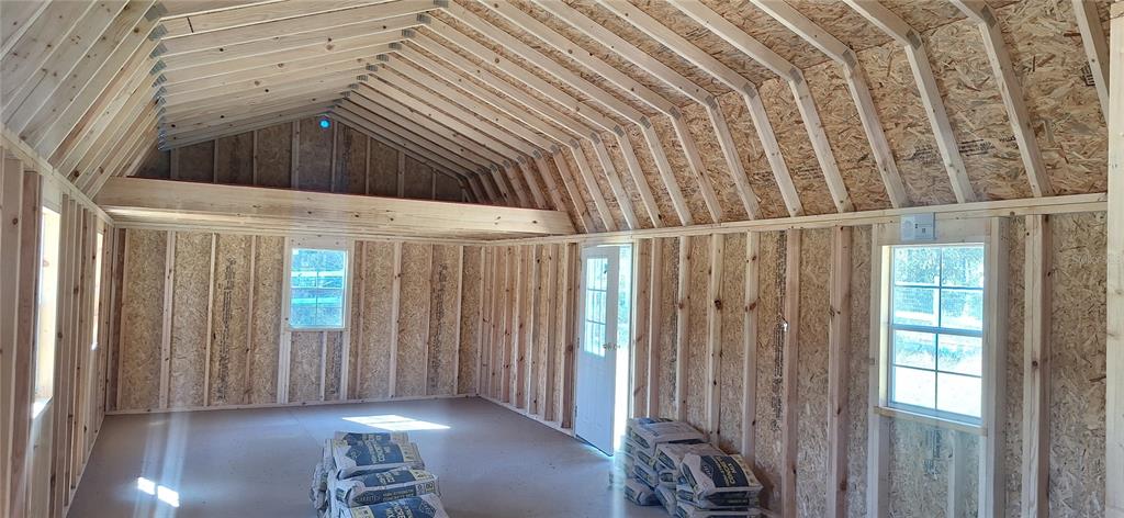 7285 Norman Street Webster, FL 33597 - Photo 9 of 11 a view of an entryway with wooden floor
