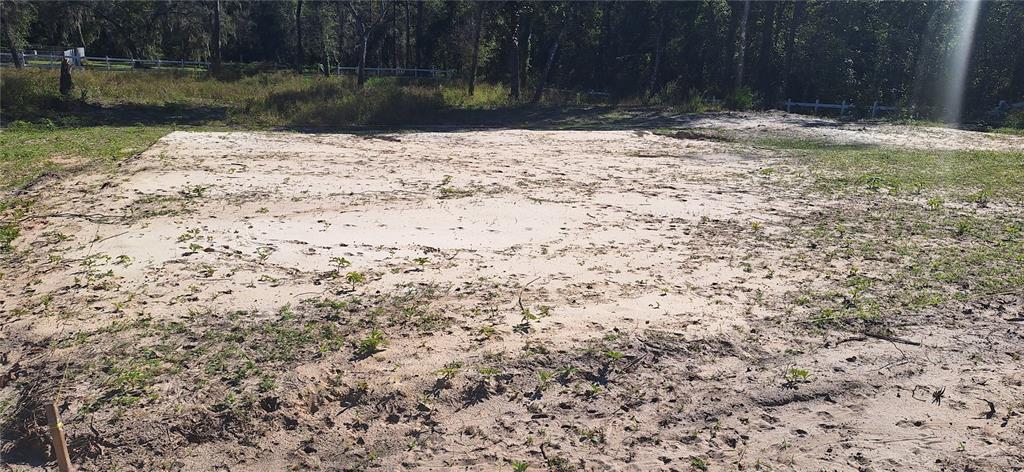 7285 Norman Street Webster, FL 33597 - Photo 10 of 11 a view of lake with a yard