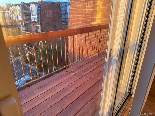 a balcony with a book shelf