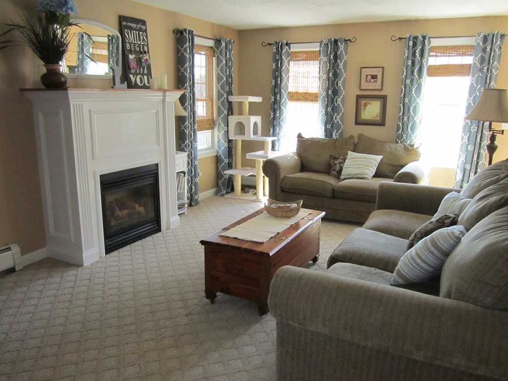 3 A Oakham Road North Brookfield, MA 01535 - Photo 14 of 26 a living room with furniture and a fireplace