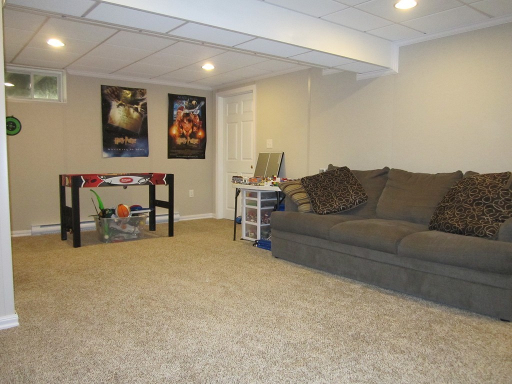 3 A Oakham Road North Brookfield, MA 01535 - Photo 19 of 26 a living room with furniture and a couch