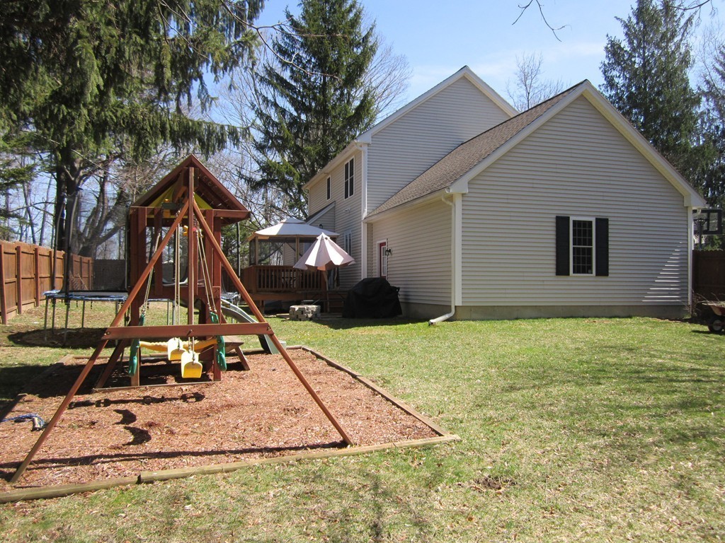 3 A Oakham Road North Brookfield, MA 01535 - Photo 23 of 26 a view of a house with a backyard