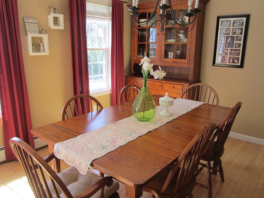 3 A Oakham Road North Brookfield, MA 01535 - Photo 3 of 26 a view of a dining room with furniture window and wooden floor