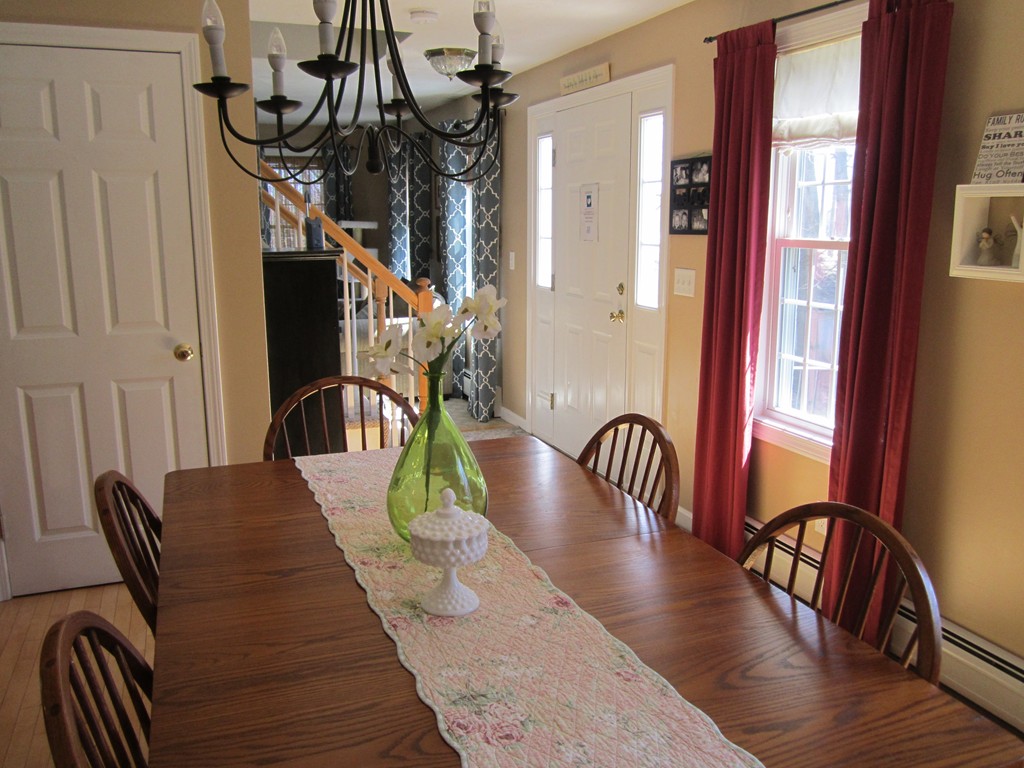 3 A Oakham Road North Brookfield, MA 01535 - Photo 4 of 26 a view of a dining room with furniture window and wooden floor