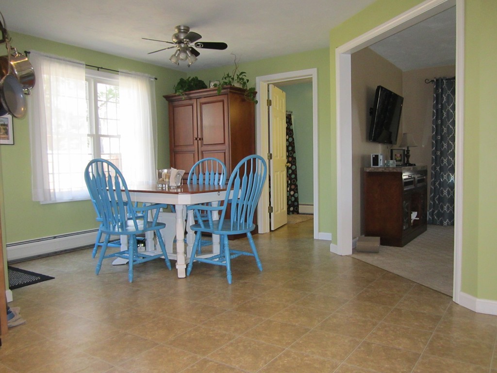 3 A Oakham Road North Brookfield, MA 01535 - Photo 7 of 26 a view of a dining room with furniture window and outside view
