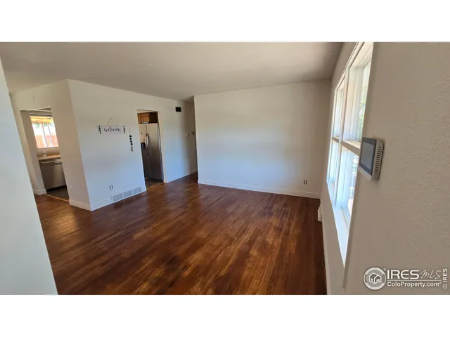 a black and white photo of a living room