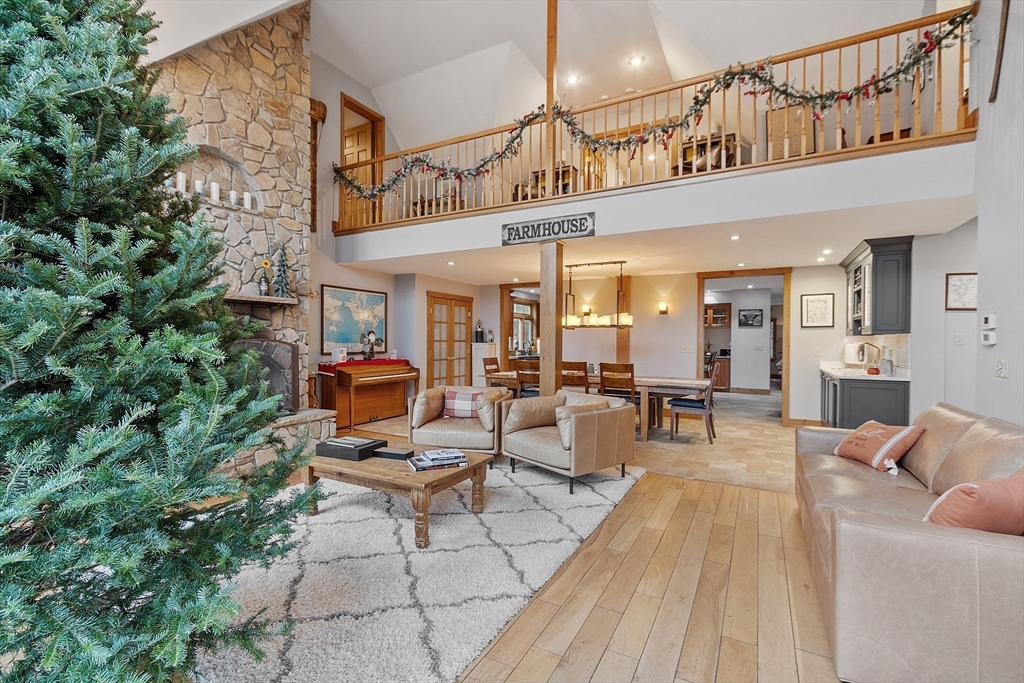 287 Chapman Road, Unit 1 Barre, MA 01005 - Photo 19 of 38 a living room with furniture a window and potted plants