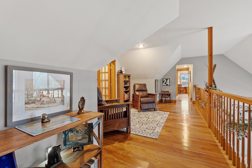 287 Chapman Road, Unit 1 Barre, MA 01005 - Photo 22 of 38 a living room with fireplace furniture and a table