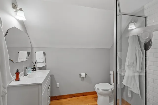 a porch with a table and chairs