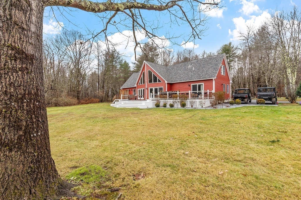 287 Chapman Road, Unit 1 Barre, MA 01005 - Photo 32 of 38 a view of swimming pool with an outdoor space and seating area