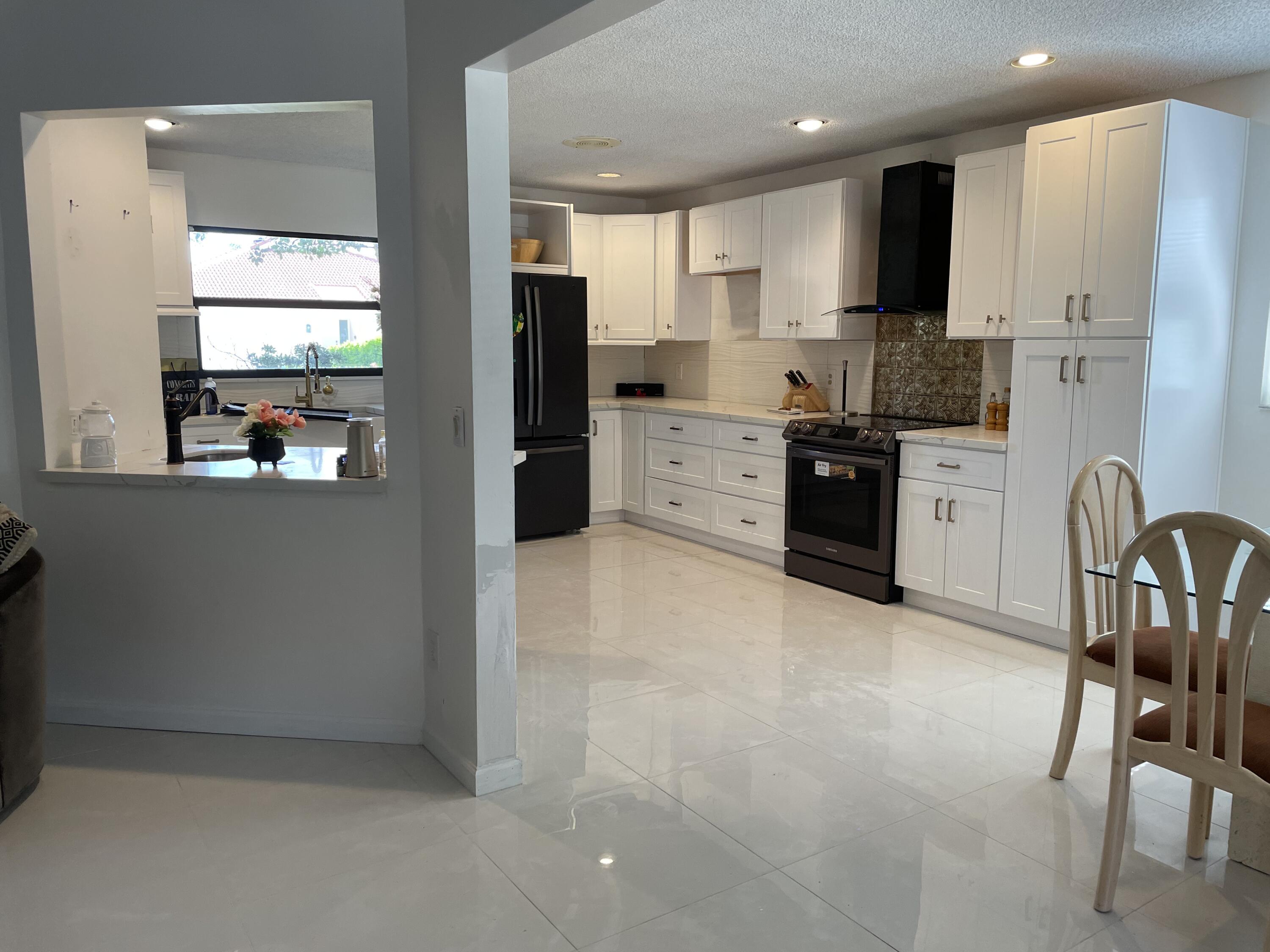 240 Northwest 70th Street Boca Raton, FL 33487 - Photo 10 of 46 C324A8DE-4A92-4C9E-8388-10BE10AEB198