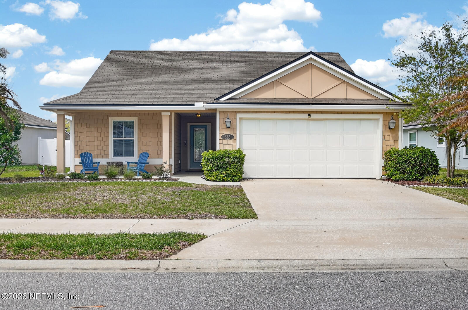 353 Green Turtle Lane St. Augustine, FL 32086 - Photo 1 of 48 a view of a white house next to a yard and large trees