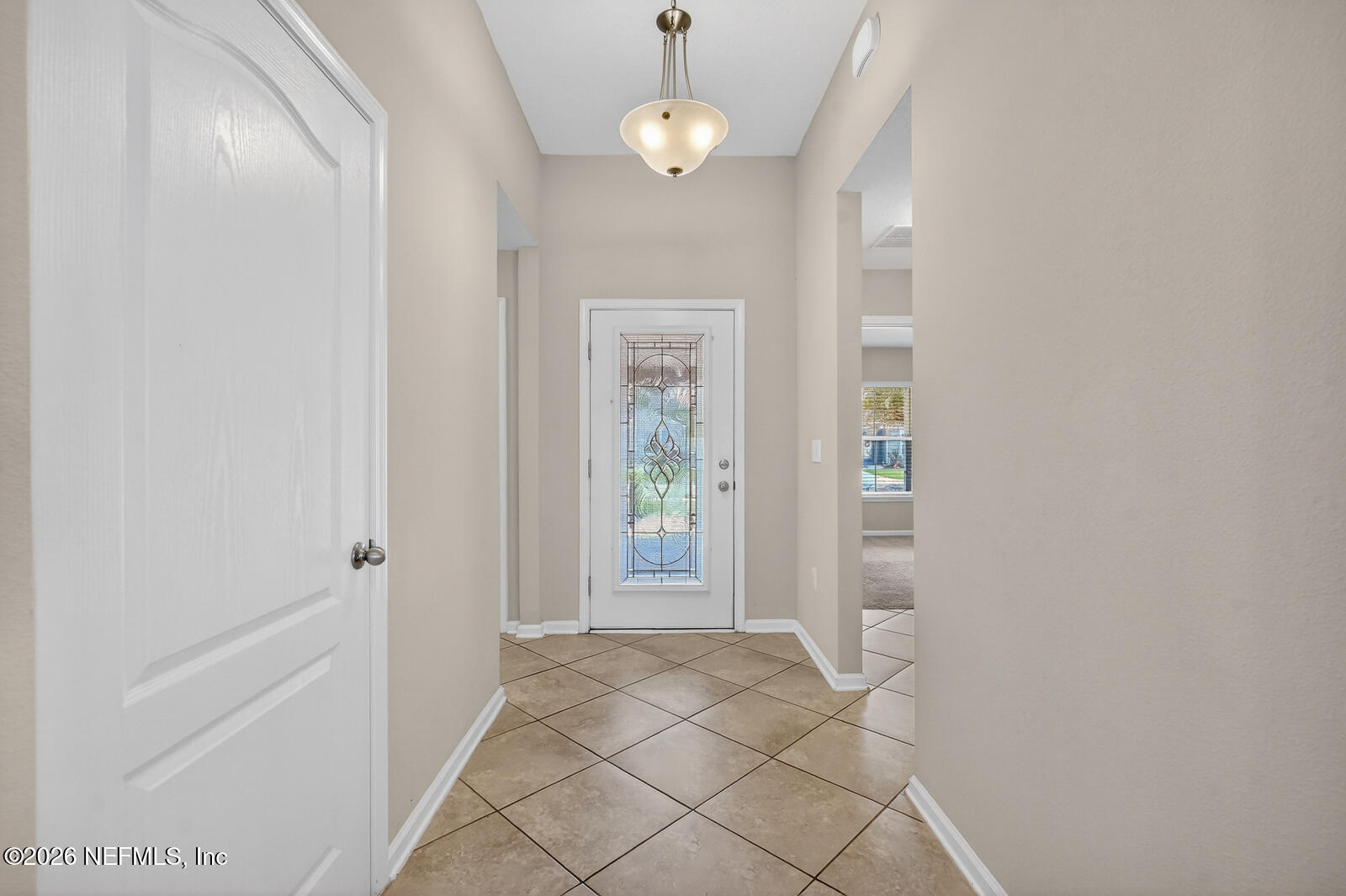 353 Green Turtle Lane St. Augustine, FL 32086 - Photo 11 of 48 a view of an entryway with wooden floor