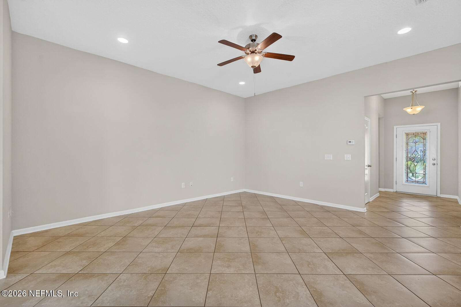 353 Green Turtle Lane St. Augustine, FL 32086 - Photo 13 of 48 an empty room with closet and fan