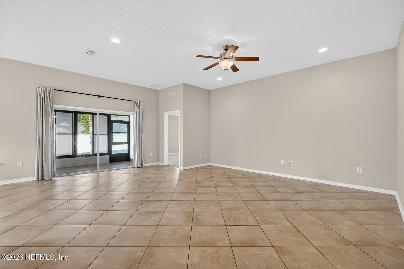 353 Green Turtle Lane St. Augustine, FL 32086 - Photo 15 of 48 a view of an empty room with a window