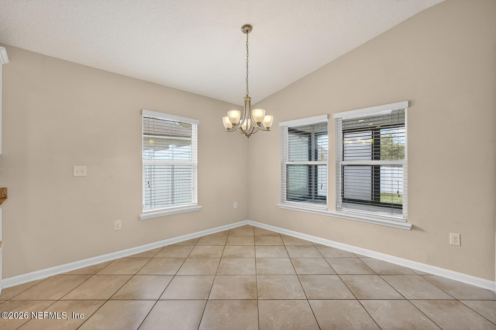 353 Green Turtle Lane St. Augustine, FL 32086 - Photo 22 of 48 a view of an empty room with a window