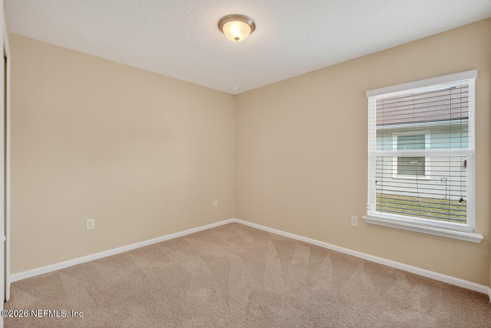 353 Green Turtle Lane St. Augustine, FL 32086 - Photo 27 of 48 an empty room with a window