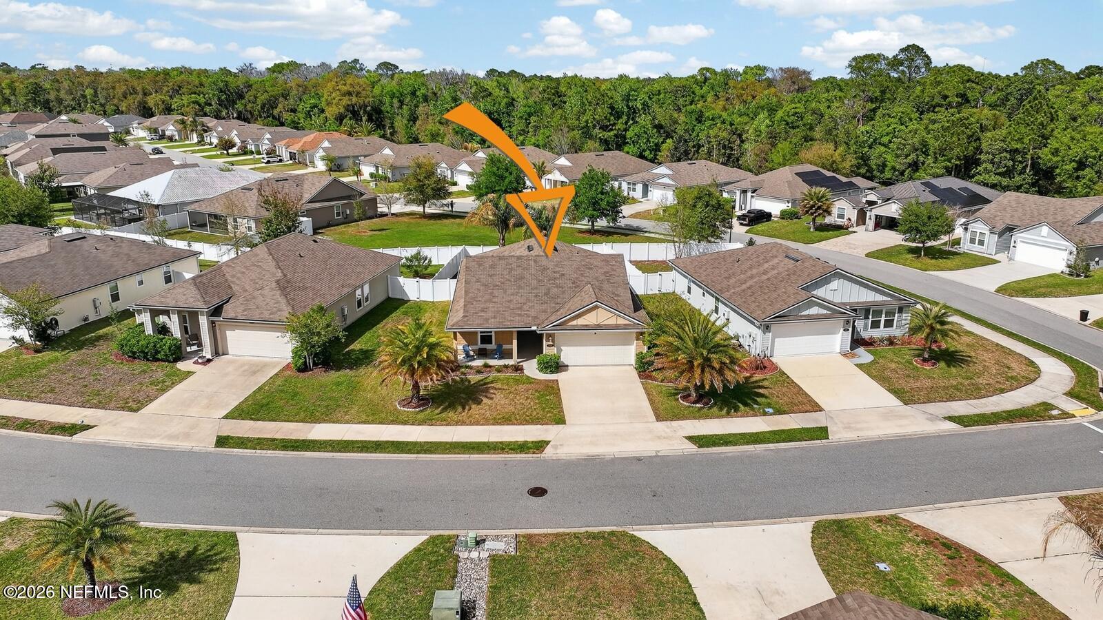 353 Green Turtle Lane St. Augustine, FL 32086 - Photo 42 of 48 an aerial view of residential houses with outdoor space and parking