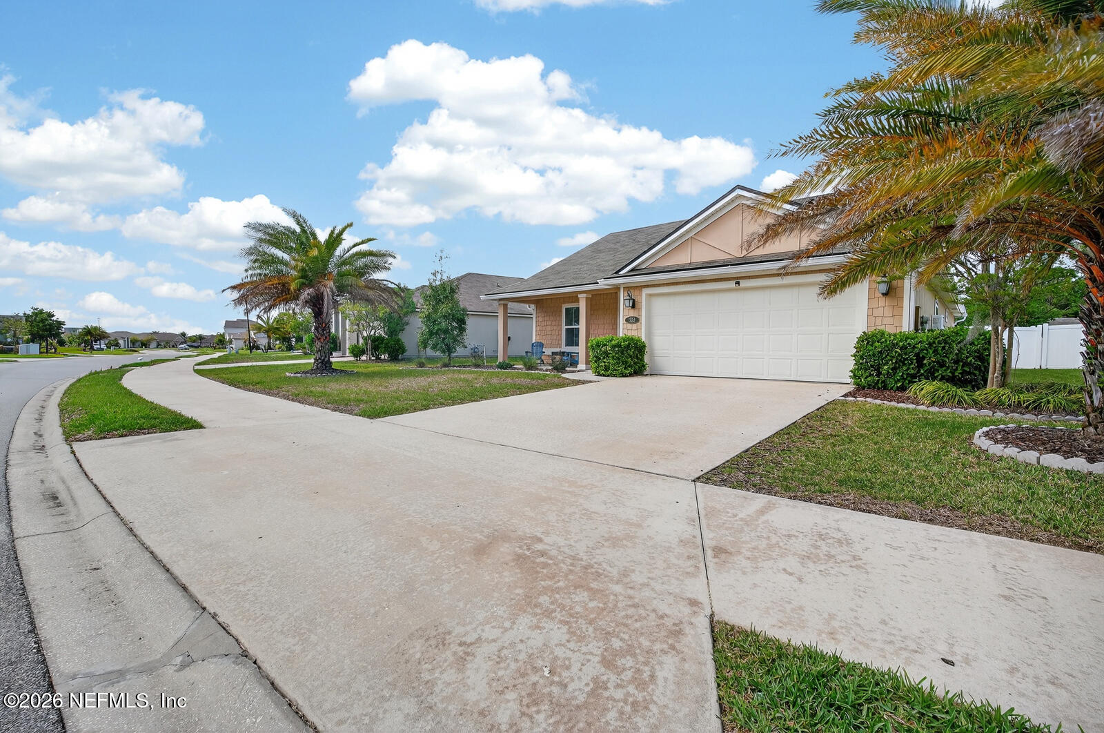 353 Green Turtle Lane St. Augustine, FL 32086 - Photo 5 of 48 a view of a house with a yard and large tree