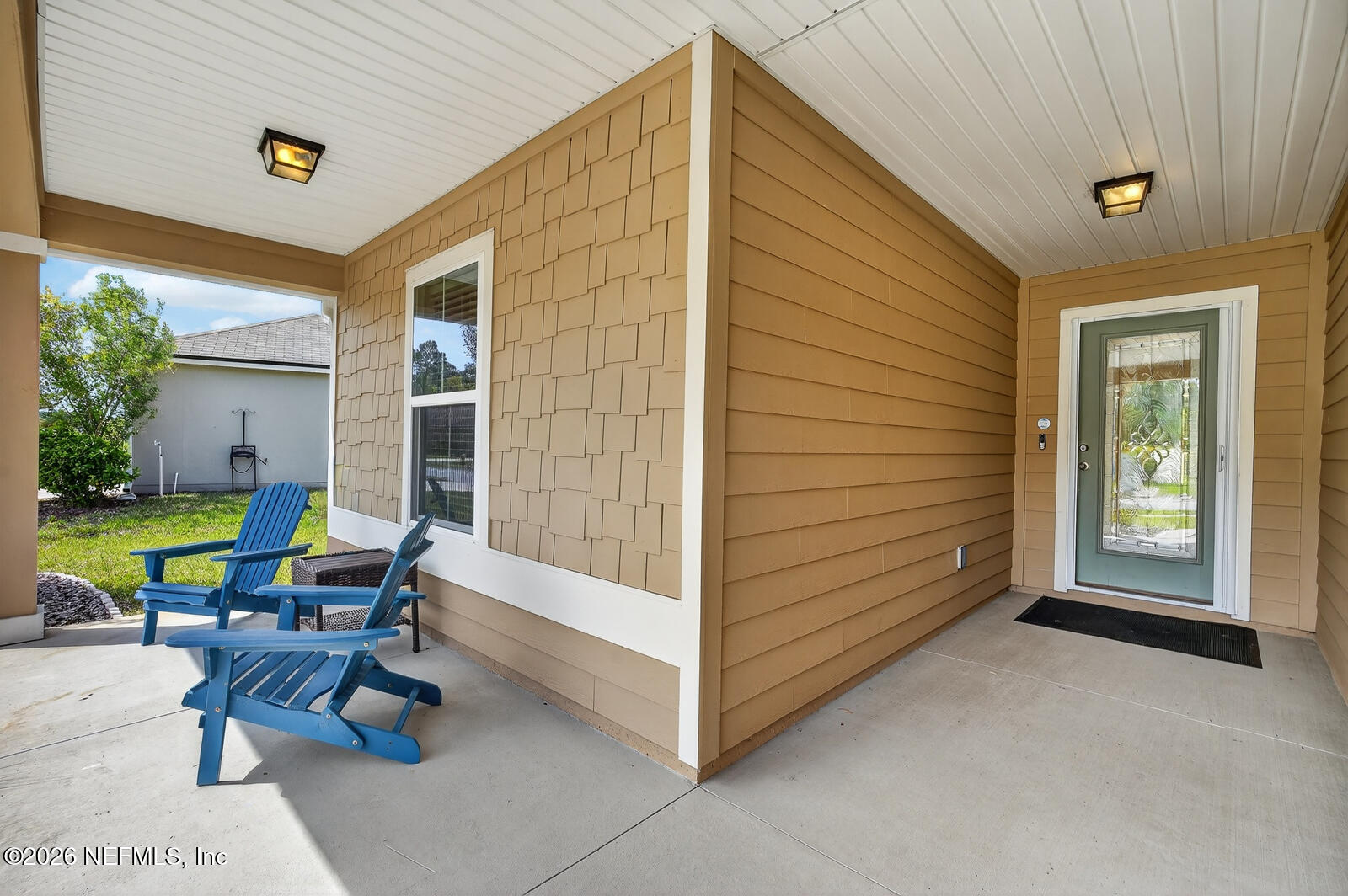 353 Green Turtle Lane St. Augustine, FL 32086 - Photo 8 of 48 a view of a patio with table and chairs