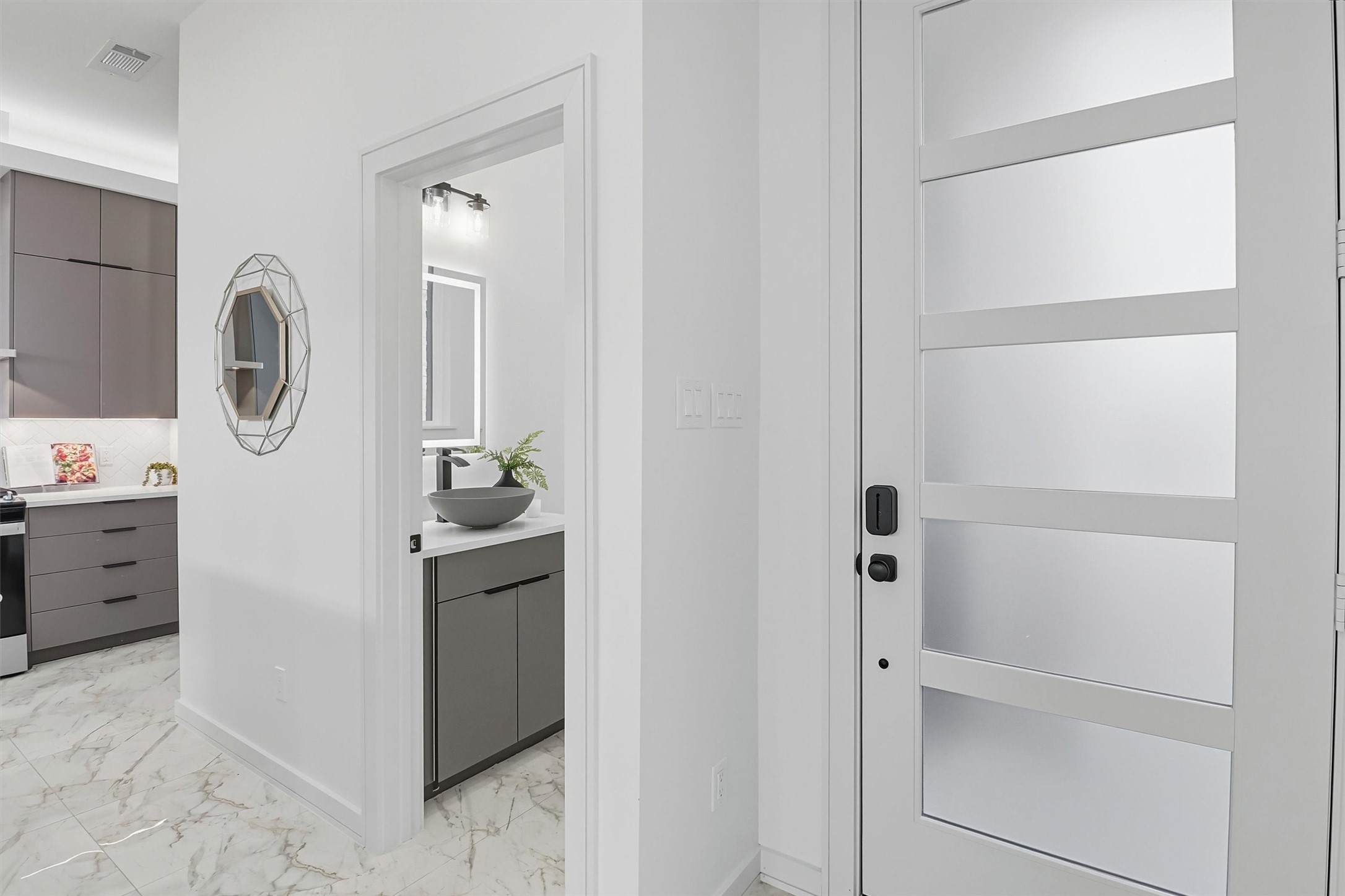 2939 El Fenice Lane Houston, TX 77057 - Photo 13 of 48 a bathroom with a shower and mirror