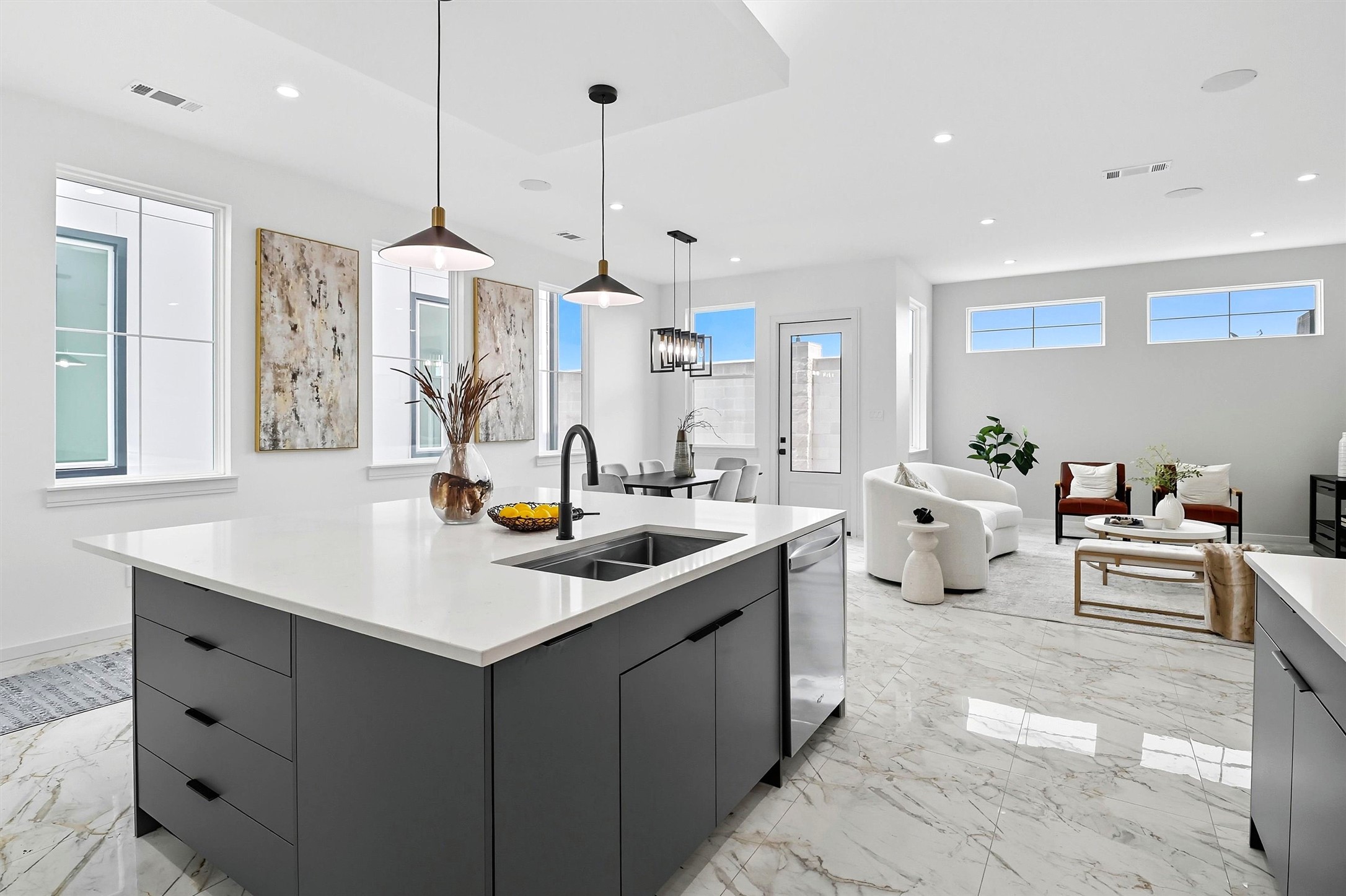 2939 El Fenice Lane Houston, TX 77057 - Photo 16 of 48 a kitchen with stainless steel appliances kitchen island granite countertop a sink a stove and a wooden floors