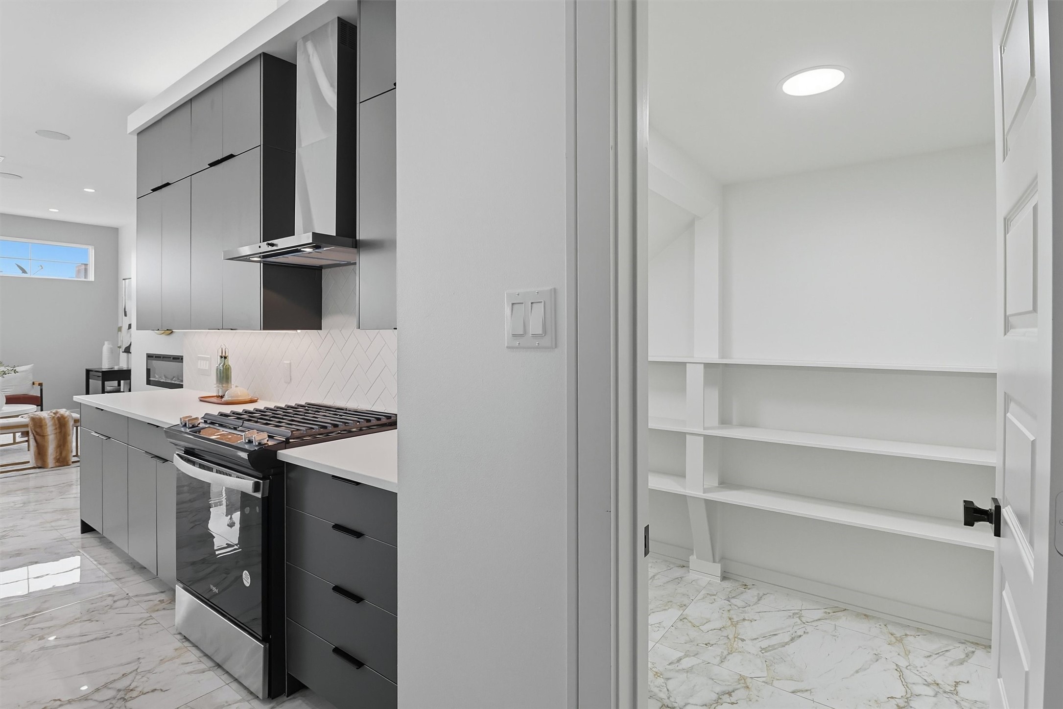 2939 El Fenice Lane Houston, TX 77057 - Photo 18 of 48 a kitchen with stainless steel appliances granite countertop a stove and a refrigerator