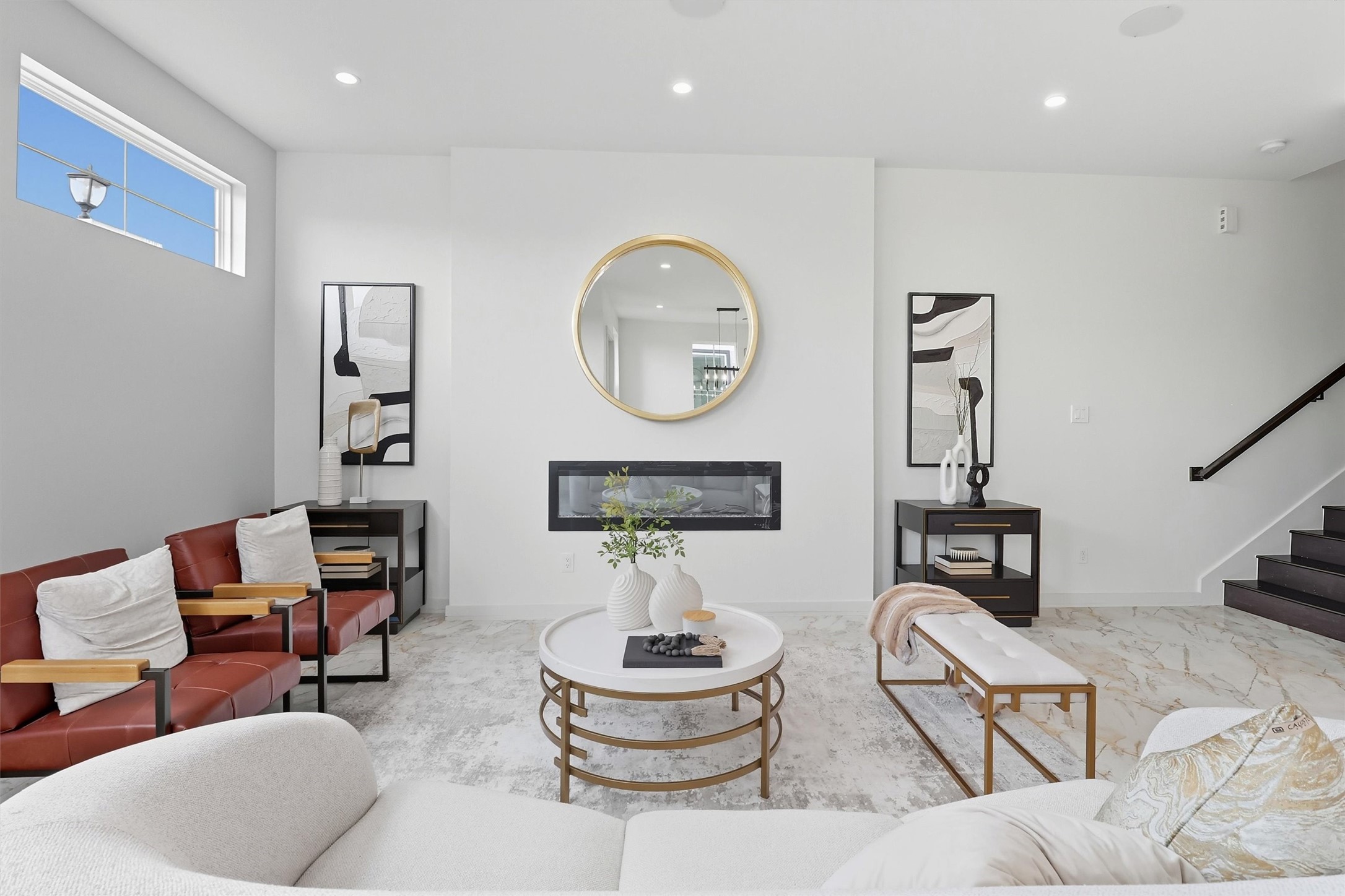 2939 El Fenice Lane Houston, TX 77057 - Photo 24 of 48 a living room with furniture a clock and a lamp